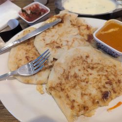Taco Miendo Bar, Grill, & Pizzeria - This is a picture of the pappusa.