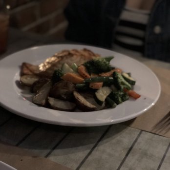 Old Man Rafferty's - Salmon filet with roasted red potatoes and veggies - Bars Near Me - New Brunswick, New Jersey