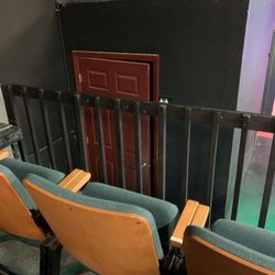Fort Myers Theater - While the stage is visible, you'll have to turn your head. The red door leads to a bathroom.