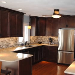 All American Kitchens & Baths - HomeCrest cabinets, Cambria quartz tops and tile backsplash