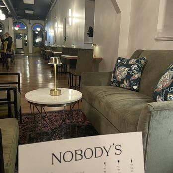 Nobody’s - Sitting in the back - Wine Bars Near Me - Syracuse, New York