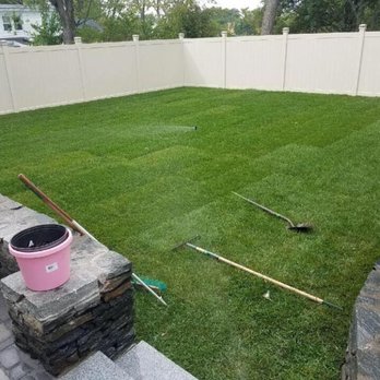 Vasquez Landscaping - a backyard with grass and tools - Landscaping Near Me - Everett, Massachusetts Vasquez Landscaping - a backyard with grass and tools - Landscaping Near Me - Everett, Massachusetts