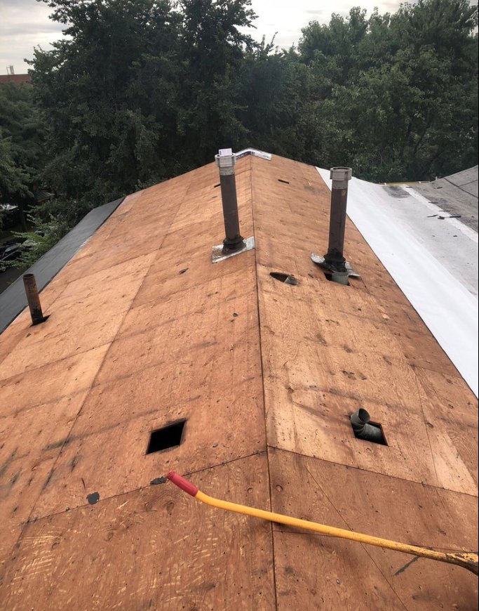 Slide of CZ Roofing Systems and Construction
