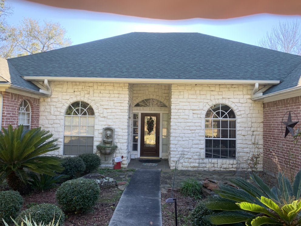 Slide of NL Strong Gutter & Roofing