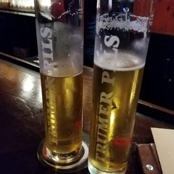 Jake Melnick's Corner Tap - Cool Pilsner glasses and flatbread pizza - Sports Bars Near Me - Chicago, Illinois Jake Melnick's Corner Tap - Cool Pilsner glasses and flatbread pizza - Sports Bars Near Me - Chicago, Illinois