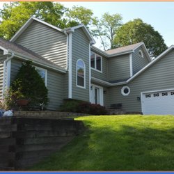 Ultimate Remodelers - Woodridge-Ivy Green-Vinyl Siding-White-Trim-Gutters-Pella Windows