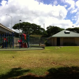 Playground on left; bathrooms on right; newly paved tennis courts in back