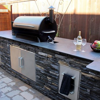 Exstream Landscaping - Paver Patio, outdoor kitchen featuring top of the line Traeger Grill. - Irrigation Near Me - Oregon City, Oregon