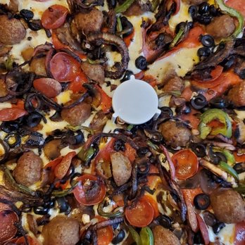Round Table Pizza - Burnt red onion. The rest of the pizza was a bit cold when I picked it up at the time it told me to pick it up. Ordered off the website. - Pizza Near Me - Burbank, California
