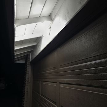 JYL Smart Electric - Security motion sensor exterior light, above the garage door, brand new light installed by Mr Jaey Lee @ Smart Electric - Electricians Near Me JYL Smart Electric - Security motion sensor exterior light, above the garage door, brand new light installed by Mr Jaey Lee @ Smart Electric - Electricians Near Me
