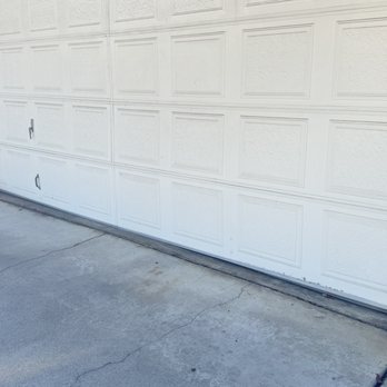 Around The Clock Garage Doors - Before the repair, I knocked the door off of it's tracks. - Garage Door Services Near Me - San Jose, California