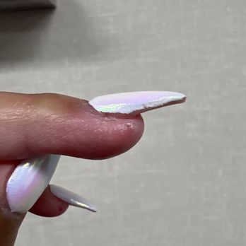 3D Nails & Beauty - Nail was glued in upward and I told him it looked like this and still didn't fix it - Waxing Near Me - Pomona, California