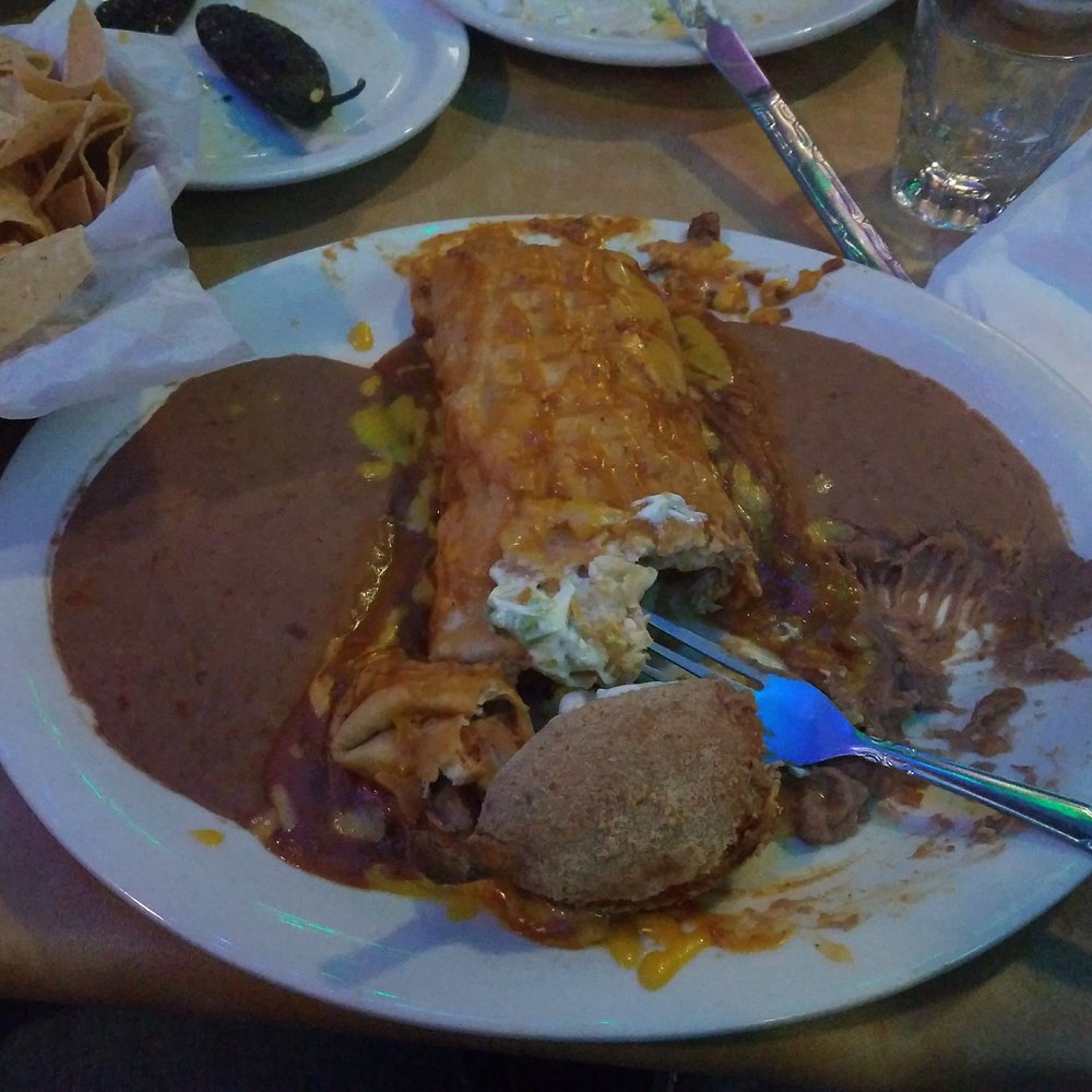 Ojeda's - Sorry y'all, I dug on before I took a photo...This is a chicken fajita chimichanga with double refried beans. - Mexican Near Me - Dallas, Texas Ojeda's - Sorry y'all, I dug on before I took a photo...This is a chicken fajita chimichanga with double refried beans. - Mexican Near Me - Dallas, Texas