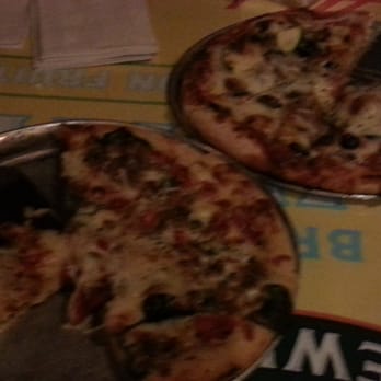 Kona Brewing - Two small sized pizzas. One is the Kona Garden and the other the Kohala. - Pubs Near Me - Honolulu, Hawaii Kona Brewing - Two small sized pizzas. One is the Kona Garden and the other the Kohala. - Pubs Near Me - Honolulu, Hawaii