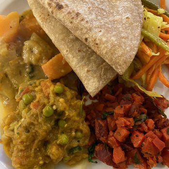SkillAtSpice - a plate of food with a burrito - Indian Near Me - Bellevue, Washington