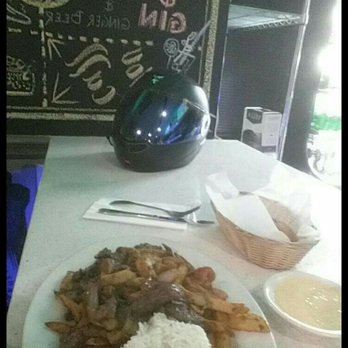 Sol Inka - Lomo Saltado bread rolls and some papa DE hauncina sauce for my bread, it's us all with potatoes. I did something different. - Peruvian Near Me - La Mirada, California