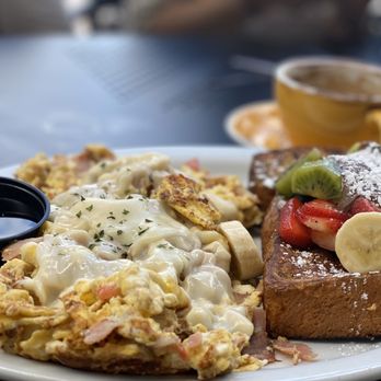 Bistro Cafe - This was amazing !!! Everything in this plate . Ham , cheese , tomato scramble eggs with French toast Nutella and fruits - Breakfast & Brunch Near Me - Miami, Florida Bistro Cafe - This was amazing !!! Everything in this plate . Ham , cheese , tomato scramble eggs with French toast Nutella and fruits - Breakfast & Brunch Near Me - Miami, Florida