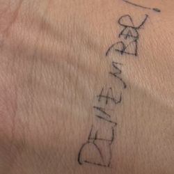 Signature Luxury Tattoo Studio - Franco's terrible fading tattoo.