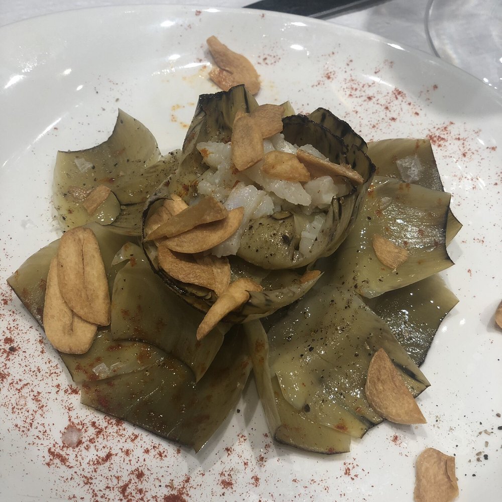 Eslava - Artichoke with shaved cod and fried garlic - Tapas Bars Near Me - Seville, SE Eslava - Artichoke with shaved cod and fried garlic - Tapas Bars Near Me - Seville, SE