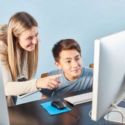 Brightmont Academy - Student receiving one-to-one instruction from teacher
