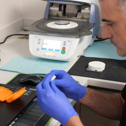 Pro Dental Group - Pro Dental Group clinician preparing a custom dental restoration using advanced digital technology.