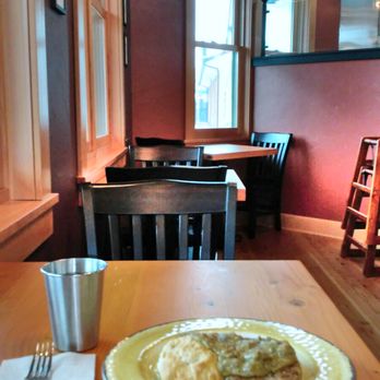 The Park Side Café - Biscuits and a chicken fried seitan patty smothered in mushroom gravy! High ceilings beyond, and open kitchen barely visable to the right. - Vegan Near Me - Olympia, Washington The Park Side Café - Biscuits and a chicken fried seitan patty smothered in mushroom gravy! High ceilings beyond, and open kitchen barely visable to the right. - Vegan Near Me - Olympia, Washington