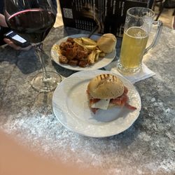 Wine, lemon beer and two tapas