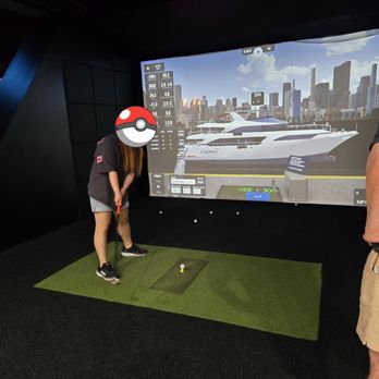 Swing Theory Indoor Golf - Golf simulator that Swing Theory provides for entertainment. It got super competitive among the adults, haha - Golf Near Me - Pasadena, California