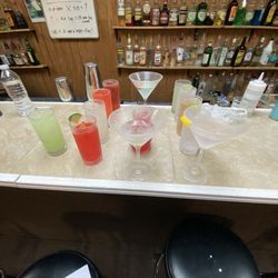 Practice drinks I made! All the 'alcohol' in the back/in the drinks is water with food coloring (it's not alcohol)!
