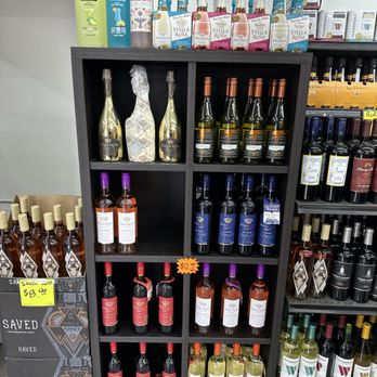 Barrio Market - a shelf full of wine bottles - Grocery Near Me - San Diego, California Barrio Market - a shelf full of wine bottles - Grocery Near Me - San Diego, California
