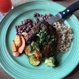 Jerk chicken with rice and mixed veggies