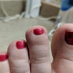 Spa Nails - My second toe was sliced with the nail file.