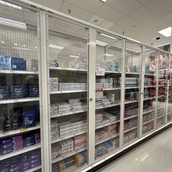 Target - Some merchandise are locked up. You need to press button for an associate to unlock and provide to you.