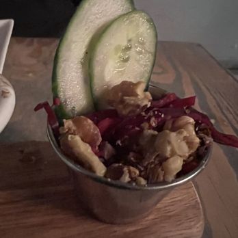 Alpin Bistro - The ridiculously small side salad featuring the $1.50 add-on of a single walnut. - Wine Bars Near Me - Gainesville, Florida