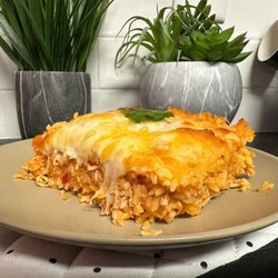 Cuban Cracker Family Kitchen - Arroz Imperial (Layers of rice, chicken, cheese and mayo)
