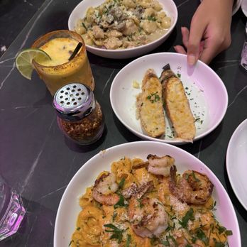 Pasta Corner - Frozen Margarita (forgot what flavor)  Garlic bread  Lumache Pink vodka sauce (bottom, I think) I don't remember what top one is - Pasta Shops Near Me - New York, New York
