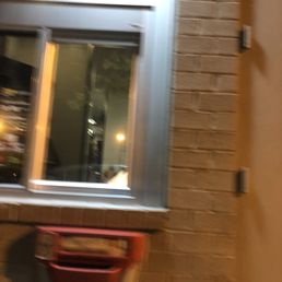 No one at the window or machine yet they are inside.