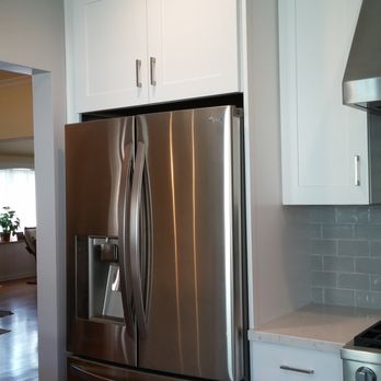 Pearl Remodeling - The storage area above the refrigerator is great for seldom, used large appliances. - General Contractors Near Me - Reseda, California Pearl Remodeling - The storage area above the refrigerator is great for seldom, used large appliances. - General Contractors Near Me - Reseda, California