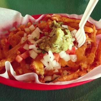 Dat Dog - Cheese fries! They let you add toppings to them if you want so this time I got a little creative with onions, tomatoes, and guac! - Hot Dogs Near Me - New Orleans, Louisiana