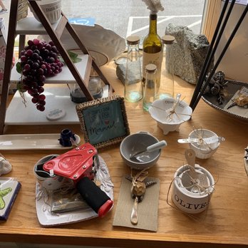 Outer Banks Olive Oil Co - a variety of items on a table - Olive Oil Near Me - Kill Devil Hills, North Carolina