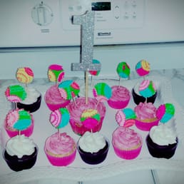 a number one surrounded by cupcakes a number one surrounded by cupcakes