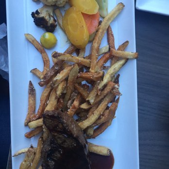 Weinkeller - Medium rare steak with red wine sauce and kick ass fries - Wine Bars Near Me - Niagara Falls, Ontario Weinkeller - Medium rare steak with red wine sauce and kick ass fries - Wine Bars Near Me - Niagara Falls, Ontario