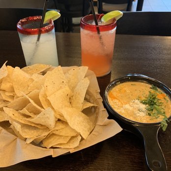 Torchy's Tacos - Torchy's Rocks, Tito's Cherry Limeade, Chile queso & chips - Tacos Near Me - Olathe, Kansas