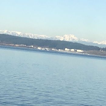 Brainbridge Ferry Hopper - Beautiful view with mountains - Public Art Near Me - Bainbridge Island, Washington