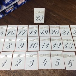Paper Moon Invitations - Table numbers with blush ribbon and crystal rings