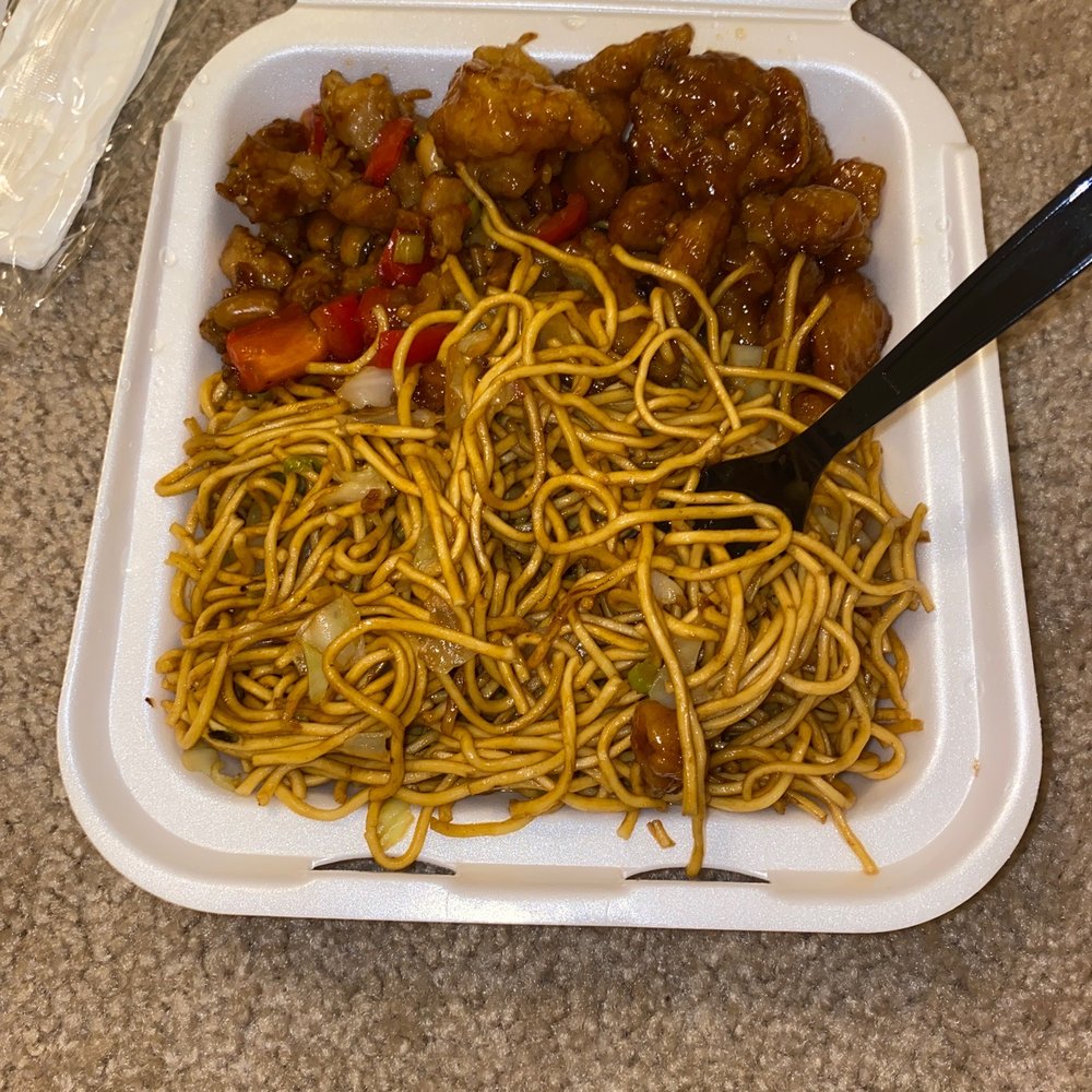 Panda Express - a takeout container with noodles and meat - Chinese Near Me - Moline, Illinois