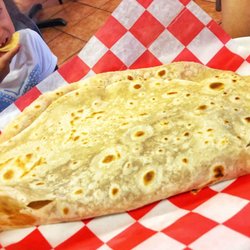 La Frontera Mexican Restaurant - My daughter was surprised to see her taco, that's a giant taco!