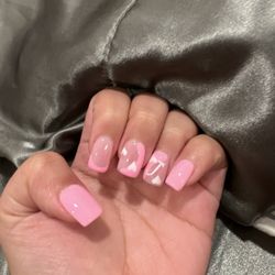 Adoring Nails - She does all services really good! I have brought friends here and they love her. come to ruby!!!