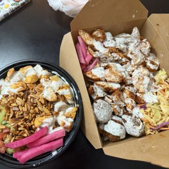 Sheishos - Original Grilled Chicken Over Rice (left) and The Kitchen Sink (right) - Food Trucks Near Me - Fort Worth, Texas Sheishos - Original Grilled Chicken Over Rice (left) and The Kitchen Sink (right) - Food Trucks Near Me - Fort Worth, Texas