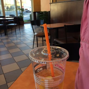 Dunkin' -  a drink in a plastic cup on a table - Donuts Near Me - Larchmont, New York